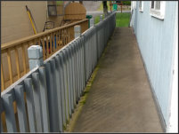 Replaced siding and railing: before